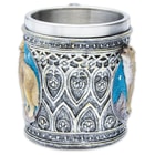 The howling wolf design is placed among swirling raised Celtic patterns and lines in simulated antique pewter
