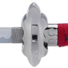 The sword has a 26” carbon steel blade that extends from a mirror-polished Tai Chi-style handguard