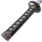The handles are traditionally wrapped in faux ray skin and black cord and the blades are razor-sharp carbon steel