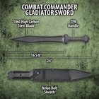 Zoomed view of gloved hand gripped around tpr rubberized handle showing a razor sharp 1060 carbon steel blade
