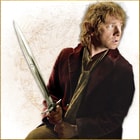 Full image of Bilbo Baggins holding the Sting Sword included in the Hobbit Bilbo Collection.