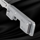 Close-up of the folded silver knife's handle