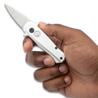 Silver Autmatic Knife held in hand