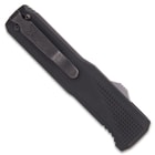 Closed pocket knife with dark grey aluminum enclosure and reversible deep carry pocket clip.
