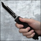 Closed OTF Tanto pocket knife featuring a glass breaking pommel and a raised "M48" logo along with a detailed handle with stylish engravings. 
