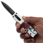 White OTF Rosefang in hand