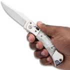 Vanguard Elite Auto Pearl in hand