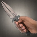 The knife has a 5 1/2”, HellFyre Damascus steel blade that’s split into two penetrating points with razor-sharp edges