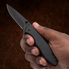 Black Timber Wolf EDC Assisted Opening Pocket Knife in hand