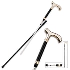 Black and gold cane blade extracted from its casing showing piercing tip with push-button release mechanism
