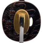 The hardwood handle is traditionally wrapped in genuine ray skin and red cord and has a matching, decorative pommel