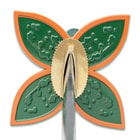 A close-up view of the clover-shaped tsuba