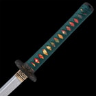 The hardwood handle is wrapped in genuine gold-colored rayskin and teal cord and there’s an engraved brass habaki
