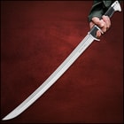 Sword in black braided sheath with an inch of carbon steel blade showing
