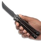 Black Butterfly Knife held in hand