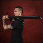 Full image of the Messer Training Sword included in the Medieval Knights Package held in hand.
