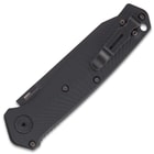 Closed benchmade mediator automatic pocket knife with a matte black finish and deep pocket clip.
