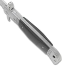 A side view of the wooden handle scales of the automatic knife