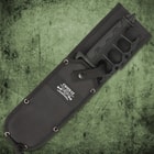 The trench knife handle is of cast metal with black, no-slip rubberized grip inserts and it features a skull crusher pommel