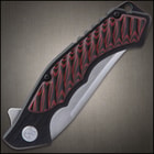 The handle is black, anodized 6061 aluminum with red and black, layered G10 inserts and a lanyard hole