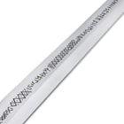 Close view of Legends of Steel sword with viking symbols etched on the blade
