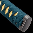 Close view of katana handle with tea dyed rayskin peeking through wrapped in a teal cord
