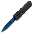 Angled image of Damascus OTF Knife.