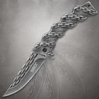 Open knife with chain design on blade and handle