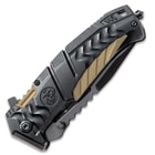 Closed black tactical knife with textured handle