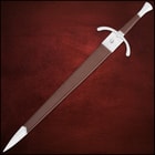 Angled Honshu sword stainless steel edge extended from polished handguard and wooden handle wrapped in brown leather
