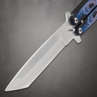 Close-up of butterfly knife blade and handle