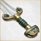 Brass plated pommel with two horse heads leading to green enameled grip and false edge hugging the stainless steel blade
