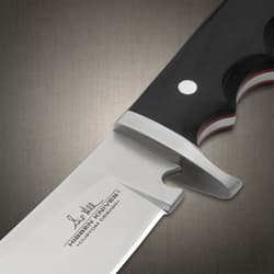 The fixed blade knife in its sheath