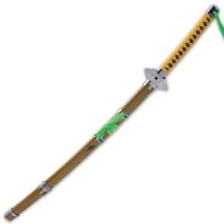 The 39” overall katana slides smoothly into a yellow wooden scabbard, which has metal accents and green cord-wrap