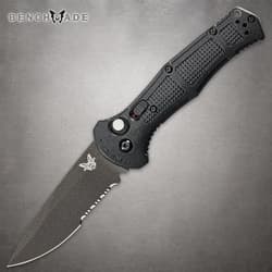Black folding knife with textured handle and serrated blade