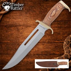 Bowie knife with wood handle on wooden background