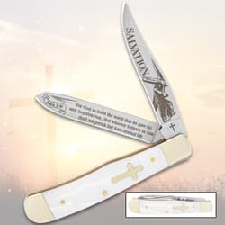 Pocket knife with religious engravings and cross handle