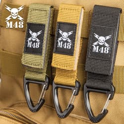 Three-Pack Black Tactical Clips - Nylon Webbing And ABS Construction - Dimensions 4”x 1”