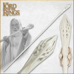 Gandalf holding a white staff with intricate design