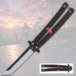 Black butterfly knife with red design, cherry blossom background