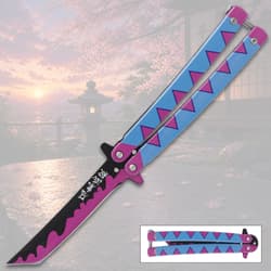 Colorful butterfly knife with scenic background