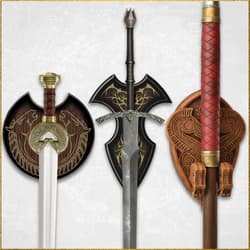 Three swords displayed with decorative plaques