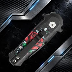 Closed knife with rose design and pocket clip