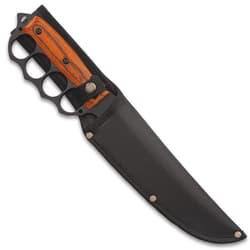 Trench knife enclosed in a black nylon sheath with an exposed pakkawood handle with a matte balck knuckle buster grip.