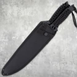 Black nylon sheath holding two machetes