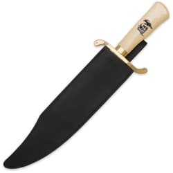 The knife is housed in a black custom leather sheath.