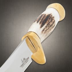 The fixed blade knife in its sheath
