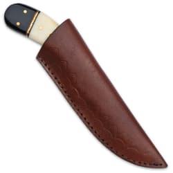 The 7 3/4” overall fixed blade knife can be carried and stored in a premium leather belt sheath