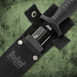 The 9 1/2” knife has a 5 1/4” AUS-8 stainless steel blade with non-reflective black coating, shown held by a person.