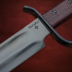 The bowie knife in its sheath